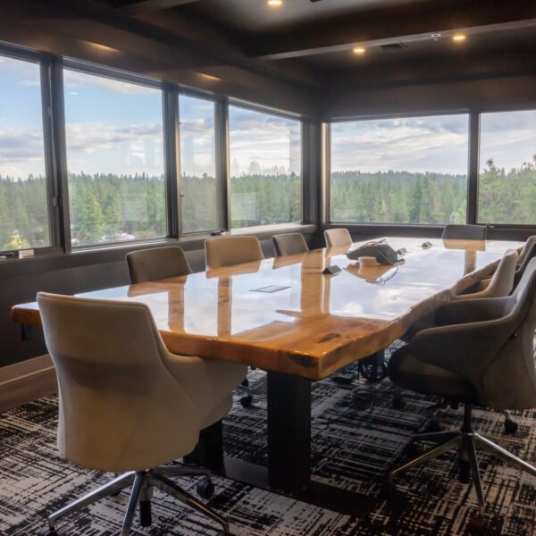 long live edge wood table showcases the haven conference room for client meetings.