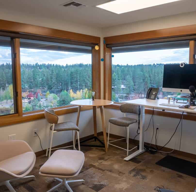 A private office at The Haven, with windows overlooking the Deschutes River.